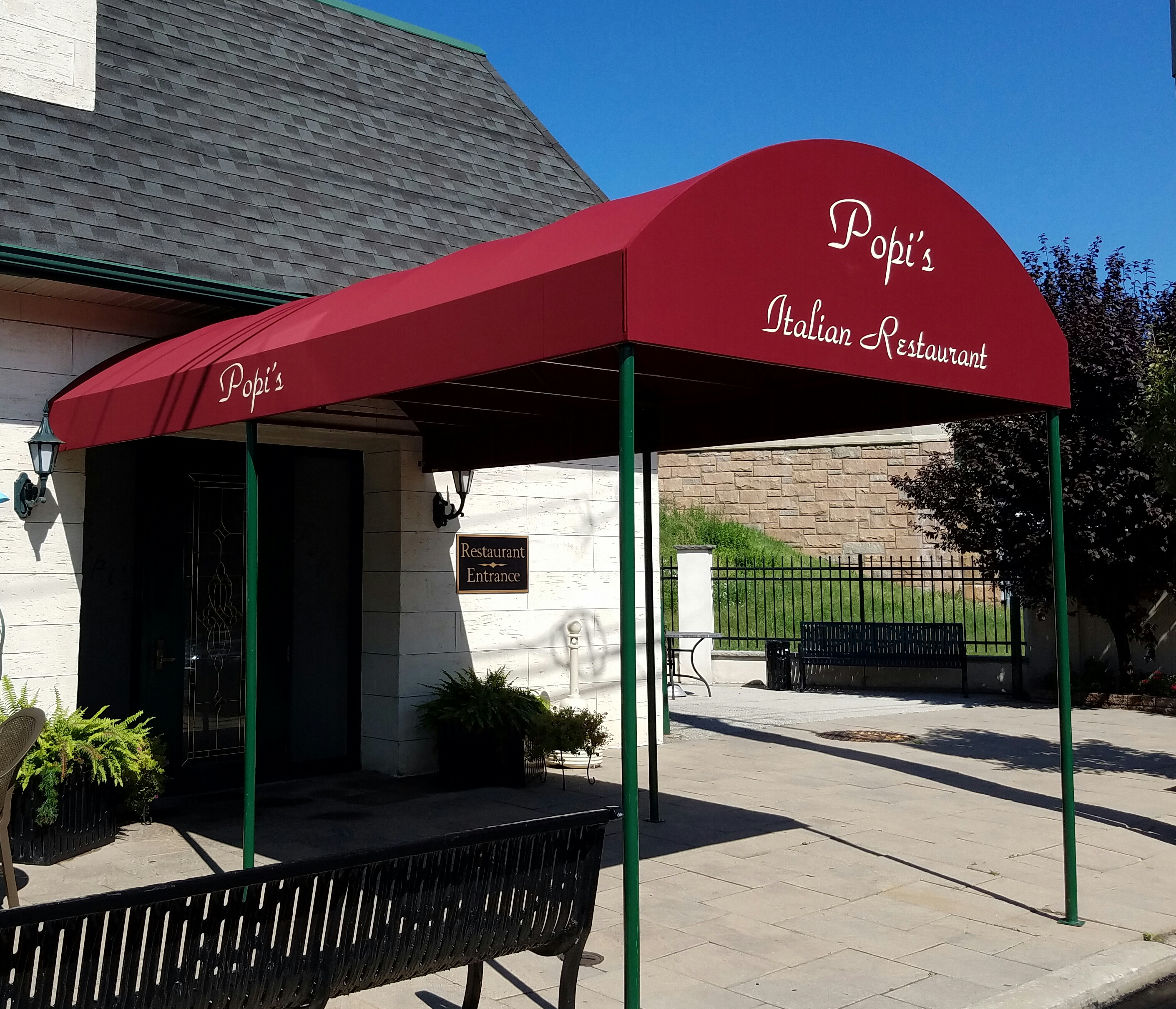 shelter guests entering your business with an entryway awning like this
