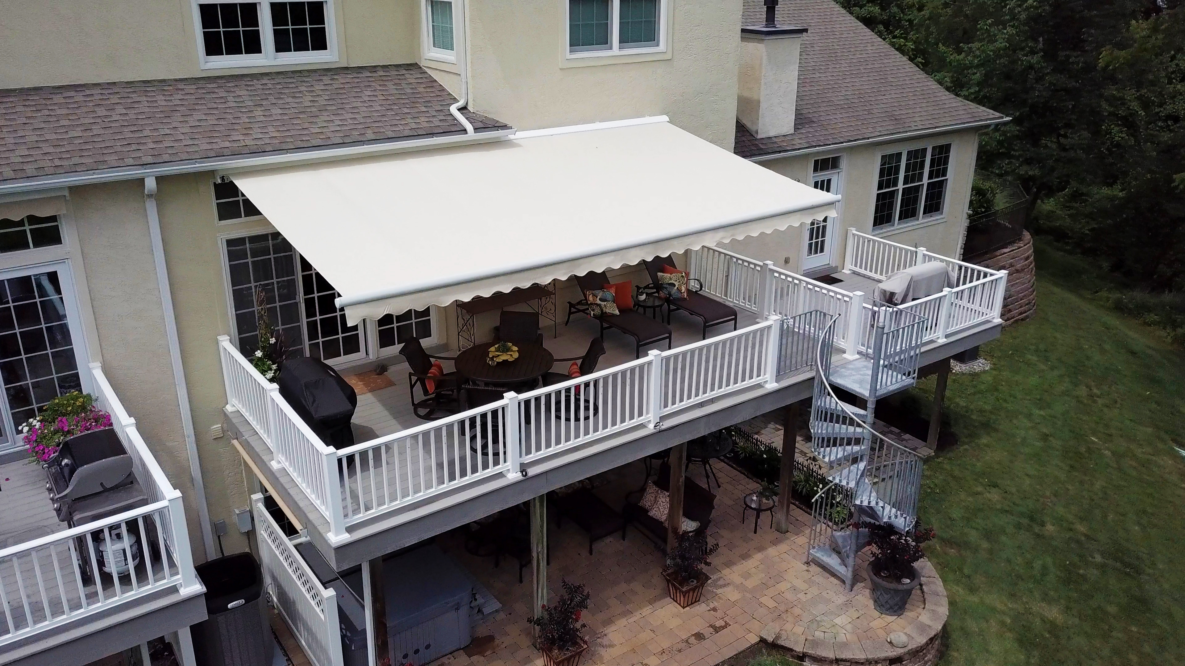 light colored residential awning for cool temperatures