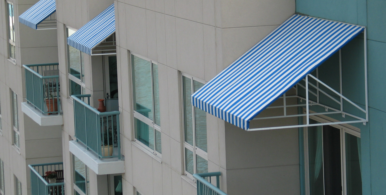 Exterior of an apartment complex with awnings